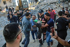 Palestinians pulled from rubble